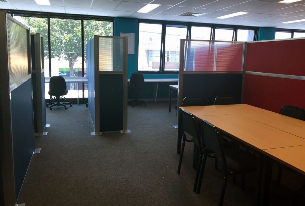 Real estate agent creates pockets of privacy with the Acoustic Panel Modular Workstation Partition System